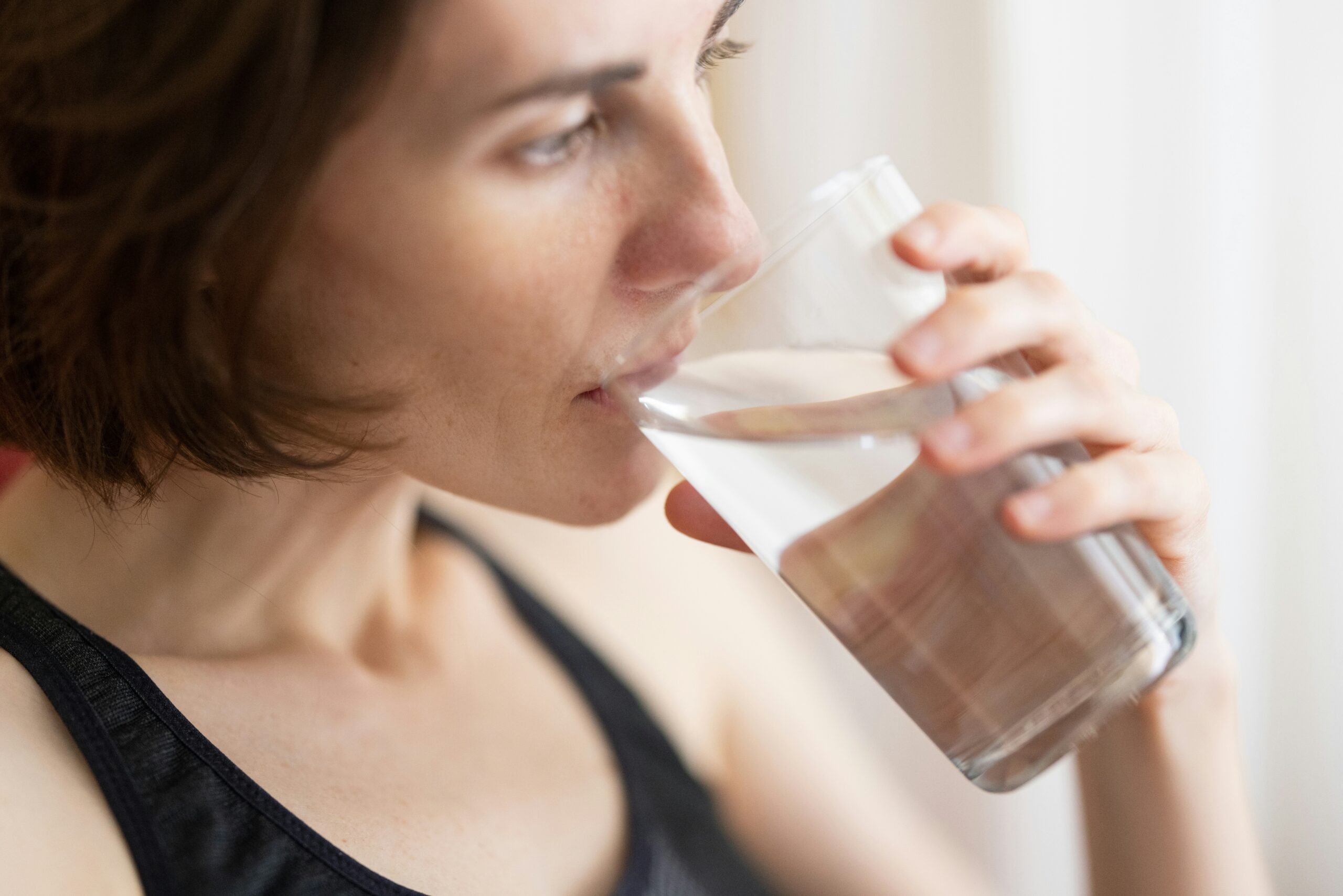 woman drinking water, water, a glass of water, air minum, gelas, air putih