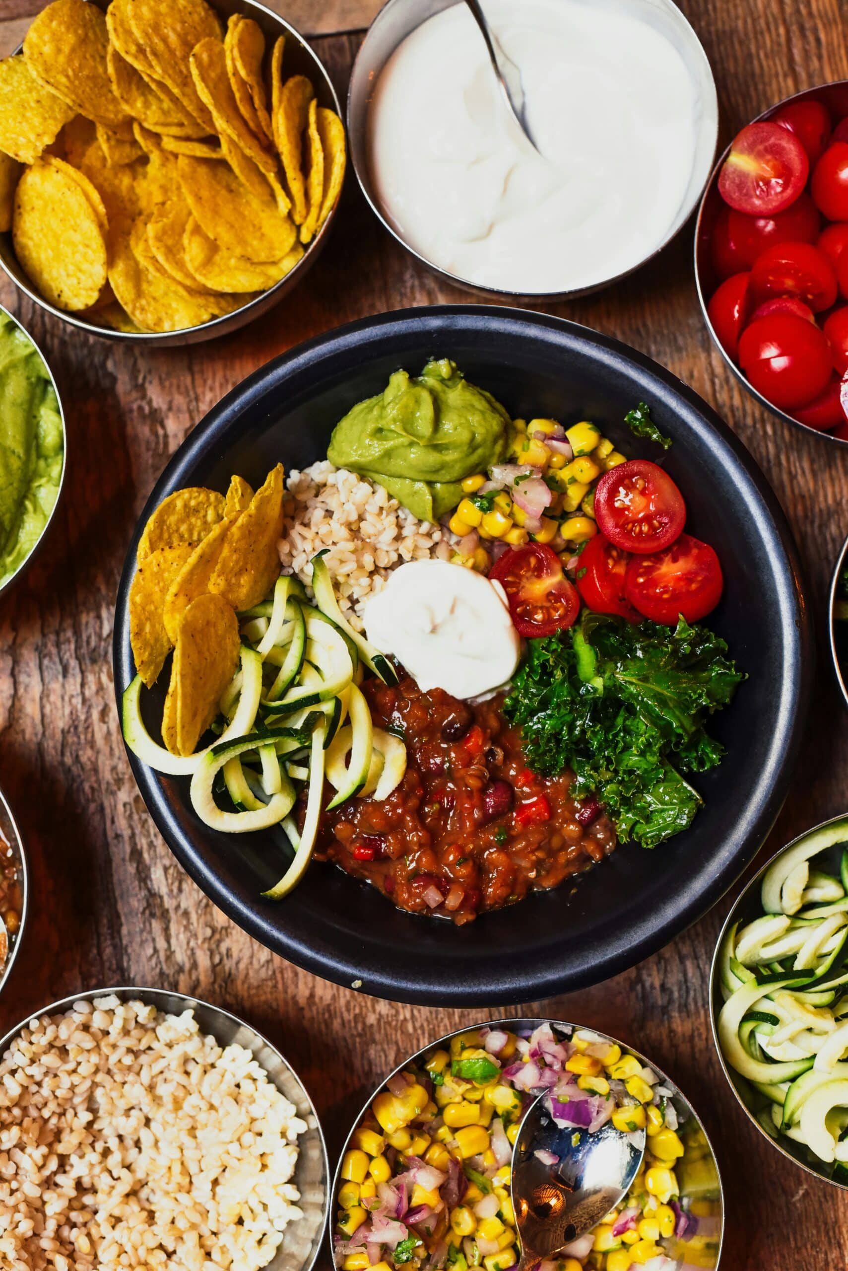 chips, tomato, avocado, guacamole, corn