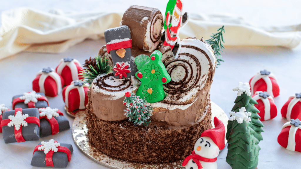 Close-up of a classic Christmas fruitcake packed with colorful dried fruits and nuts, sliced on a rustic wooden table.