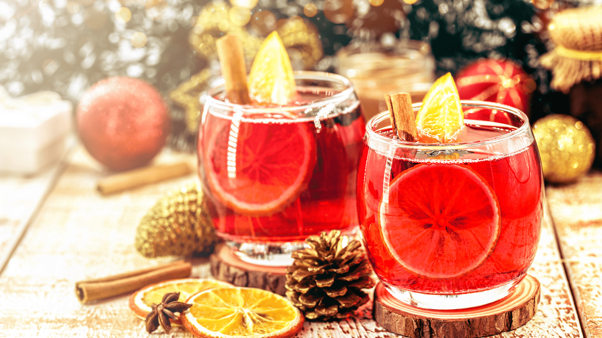 Close-up shot of hot Glühwein being poured into a glass mug, releasing steam and warm holiday aromas.
