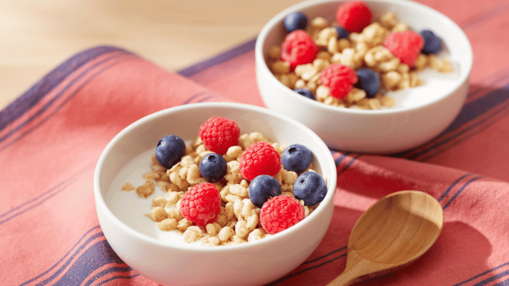 Healthy yogurt bowl with crunchy granola and honey drizzle