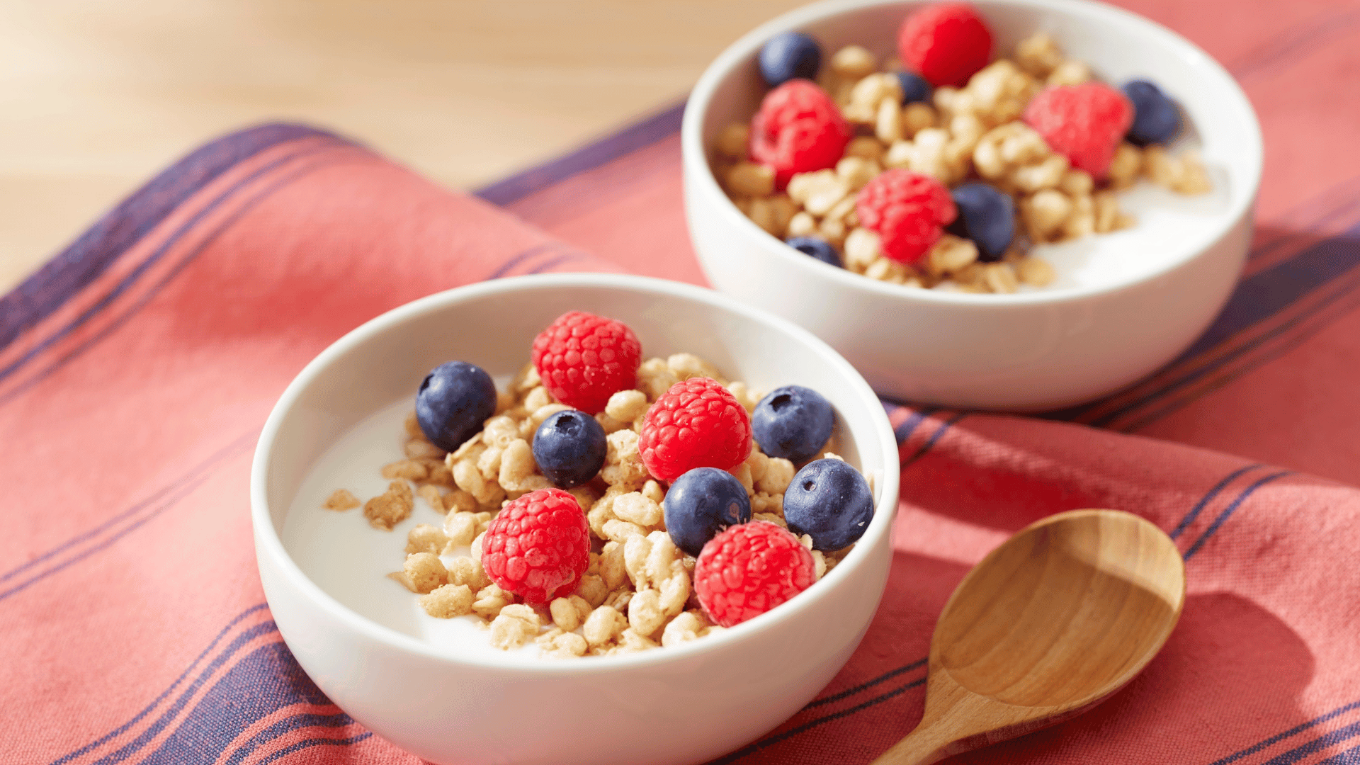 Healthy yogurt bowl with crunchy granola and honey drizzle