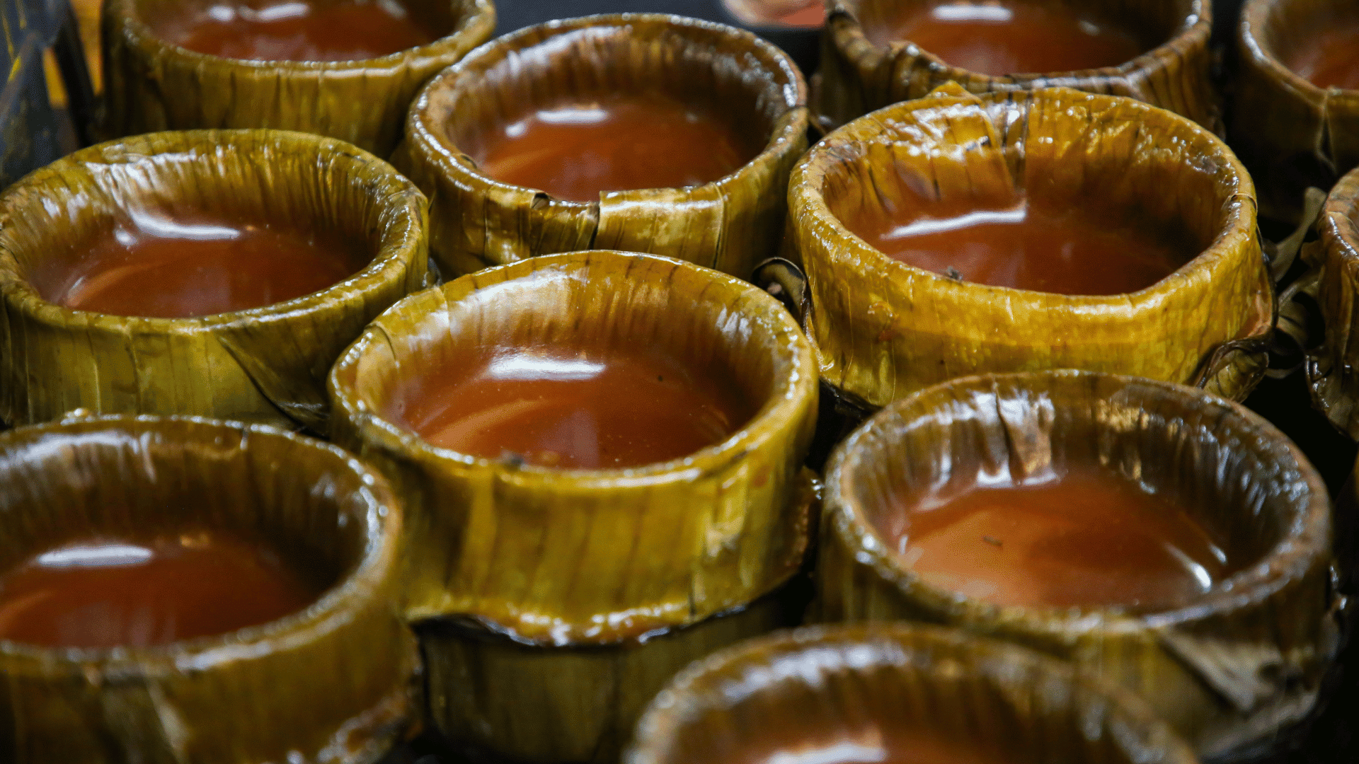 Traditional Nian Gao batter being poured into a round mold before steaming for Chinese New Year