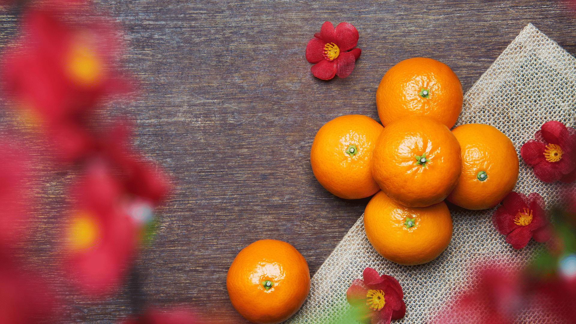 Chinese New Year table with oranges and plum blossom