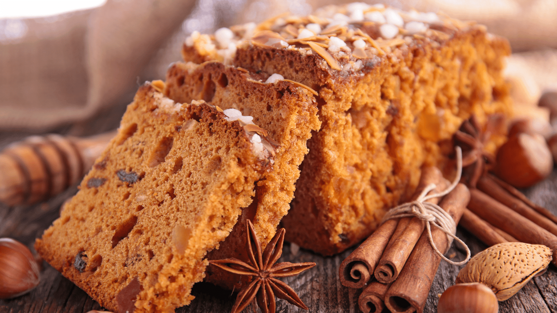 Moist gingerbread loaf cake served with powdered sugar for the holiday season